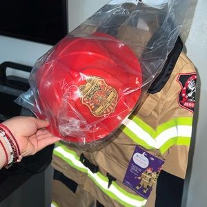 Firefighter kids costume. Brand new with its accessories